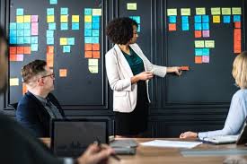 Woman making presentation with colorful visual aids