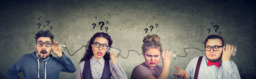 Four People play the telephone game